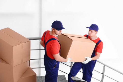Furniture and boxes being prepared for a Blackfriars moving van