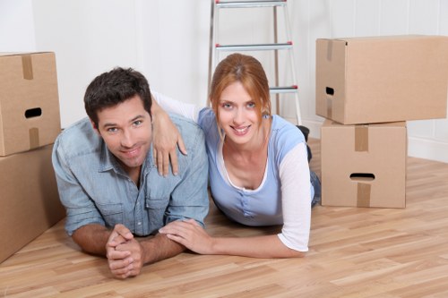 Unpacking boxes into a Blackfriars apartment after a move