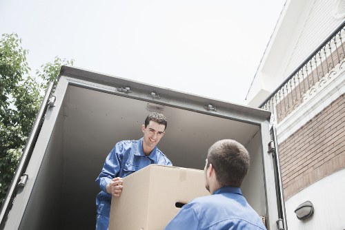 Cardboard and mixed recyclables being separated during a move
